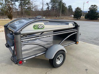 Compact SylvanSport GO camping trailer with foldable design and single wheel.