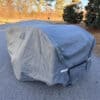 Tyvek cover protecting GO & GOAT popup campers from weather elements.
