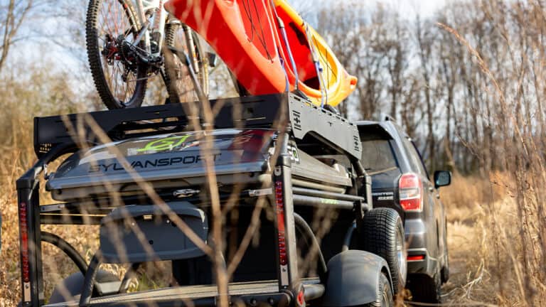 Durable DuraDeck platform mounted on SylvanSport trailer for outdoor adventures.