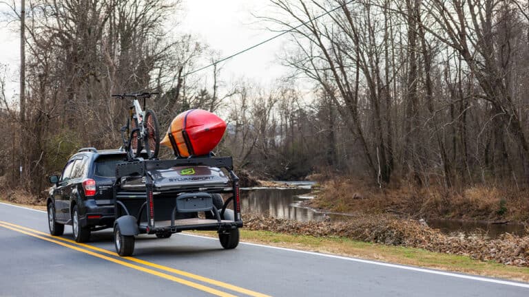 SylvanSport trailer with DuraDeck surface for outdoor adventures.