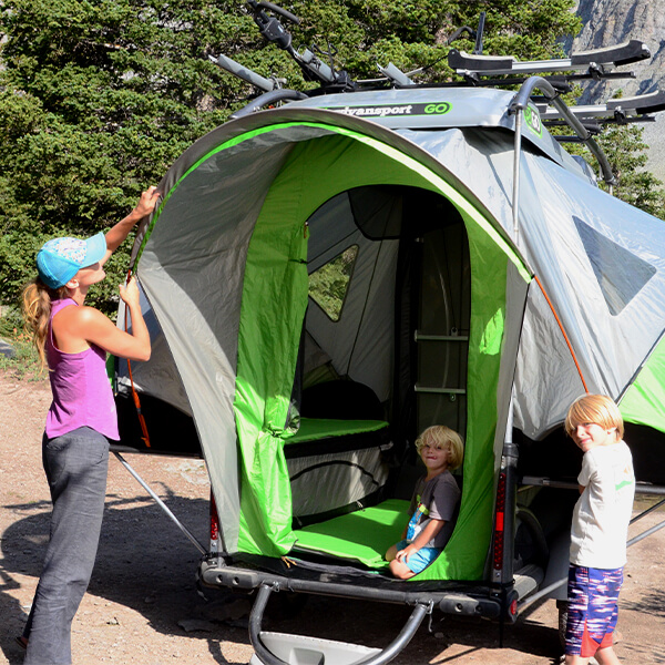 Woman setting up GO Camper