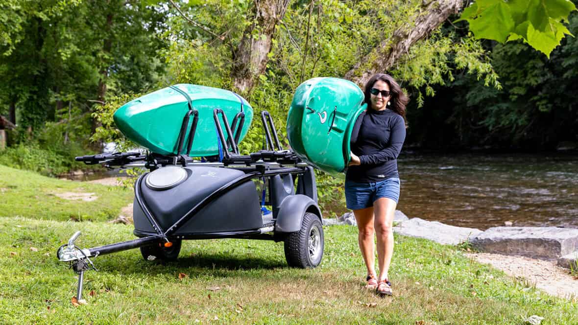GO EASY kayak trailer with two recreational kayaks