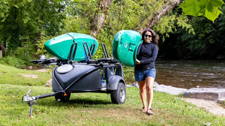 GO EASY kayak trailer with two recreational kayaks