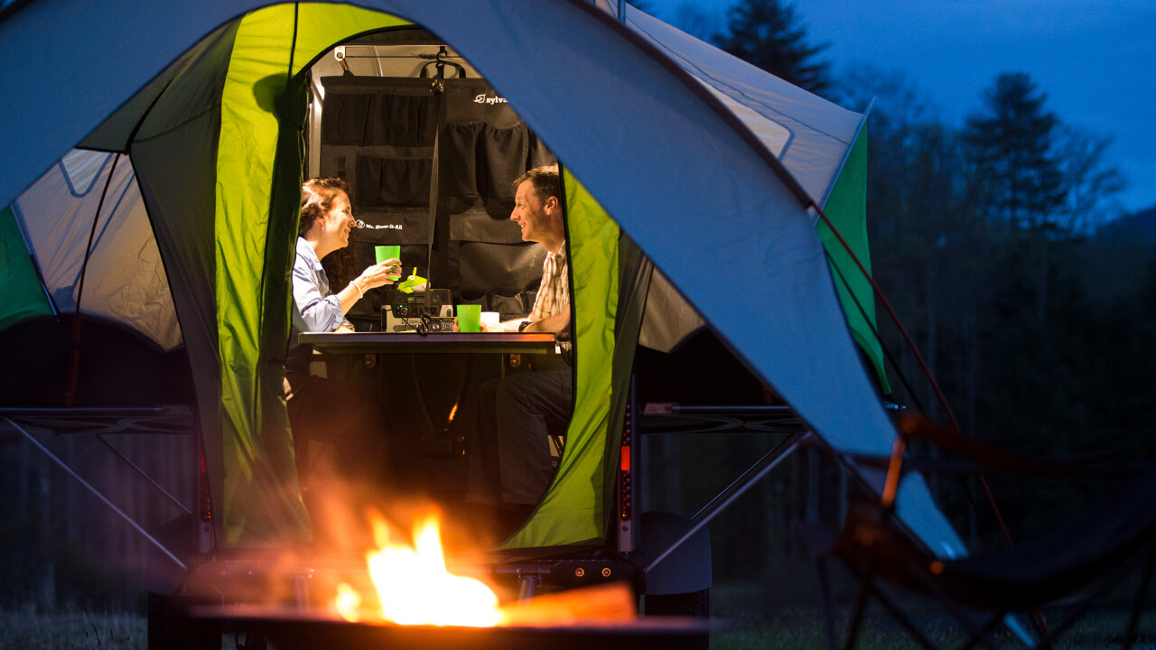 couple having drinks inside Go Camper