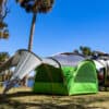 SylvanSport GOzeebo camping tent with accessories in outdoor setting.