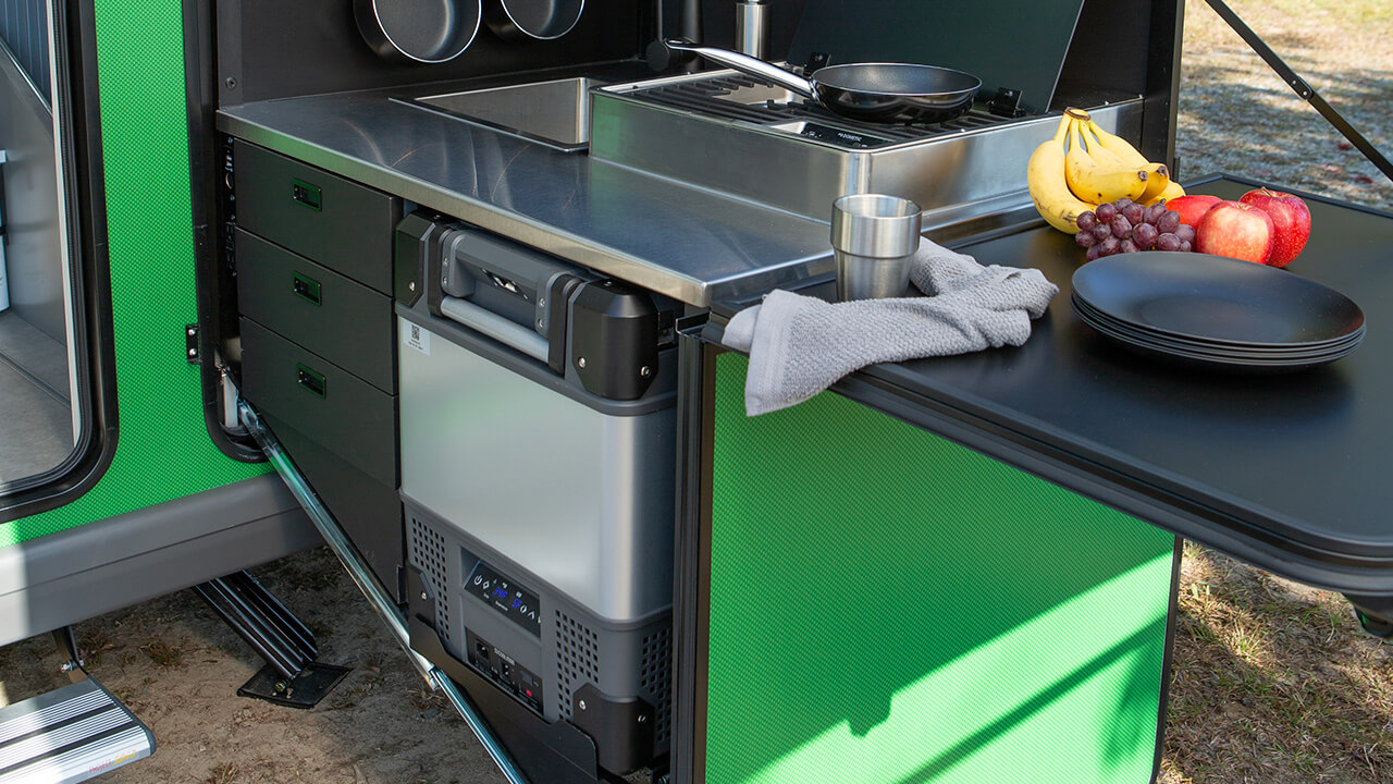 retractable kitchen with sink + stove + cooler side view